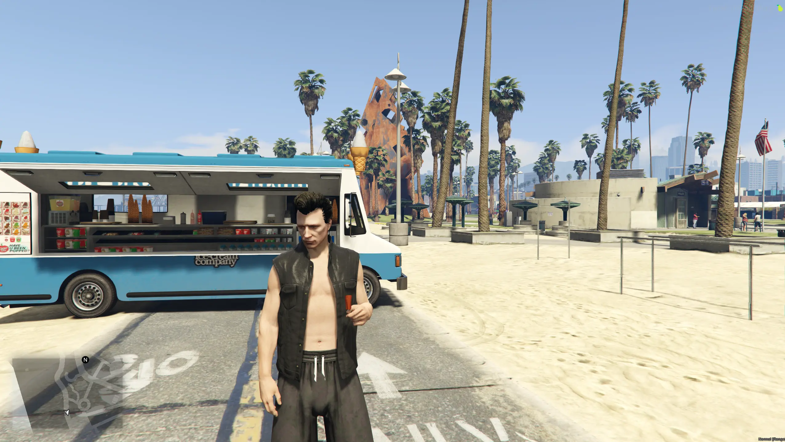 Ice cream truck with the serving hatch open on the boardwalk